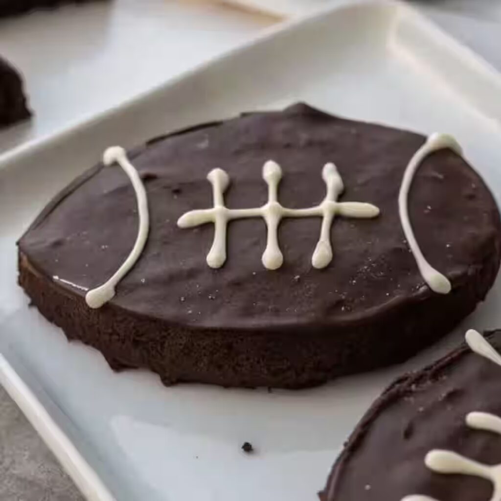 football brownies decorated with white chocolate laces