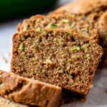 Close-up of moist zucchini bread with fresh zucchini flecks