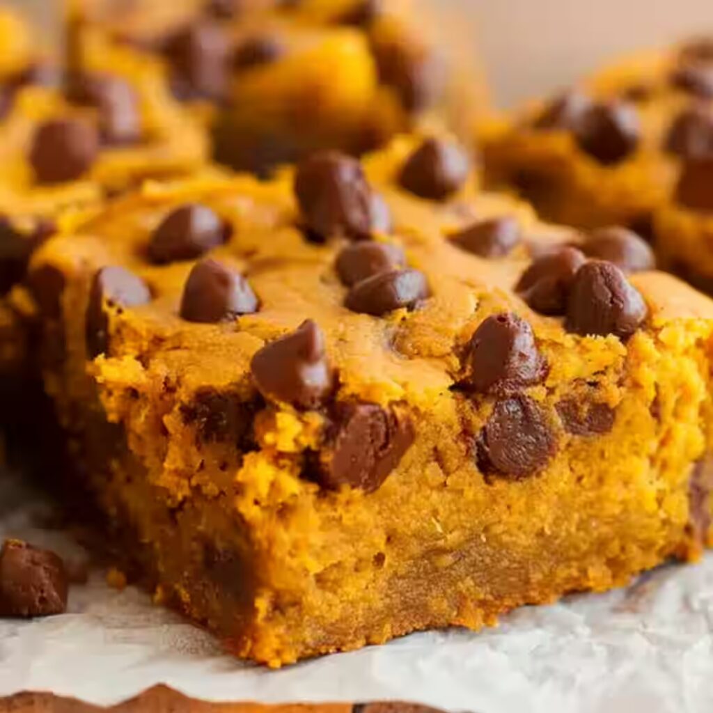 Soft and moist pumpkin chocolate chip bar with melty chocolate chips